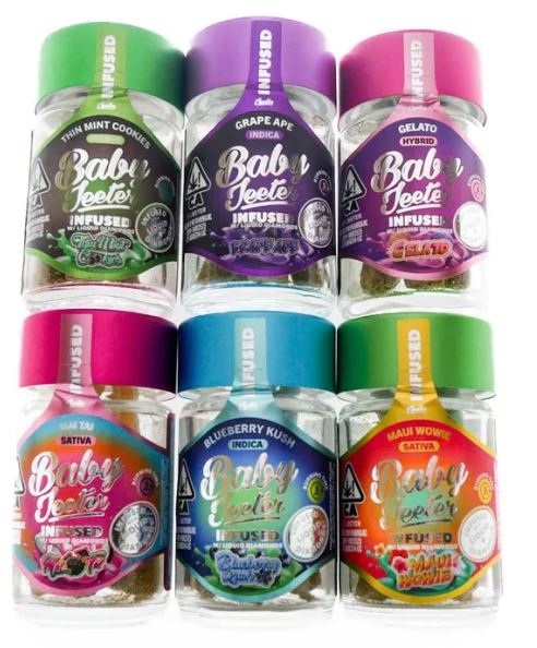 A selection of Baby Jeeter infused prerolls. The Baby Jeeter prerolls are packaged in glass jars with fun, colorful labels and lids.