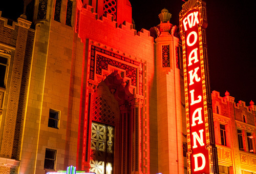 Fox Theatre neon sign illuminated at night in Oakland, representing Bay Area weed delivery services from Golden State Canna.